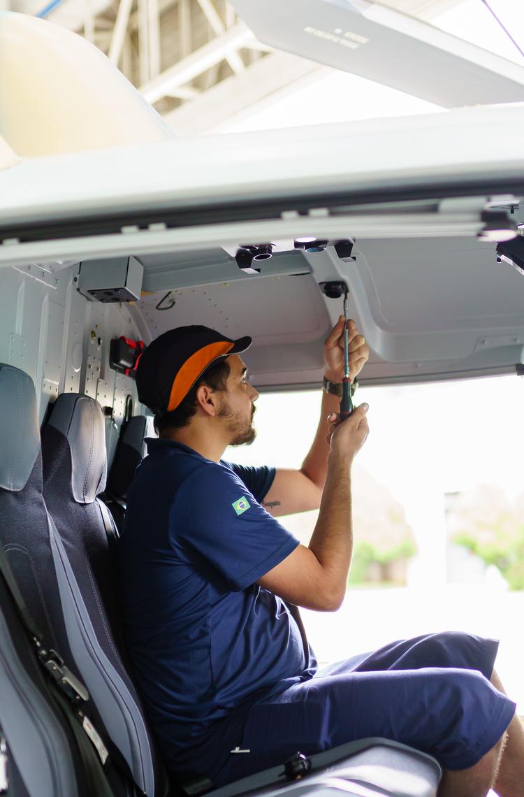 employee working with screwdriver